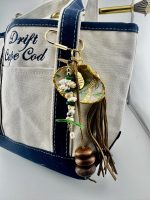 The Charm With Tassel
