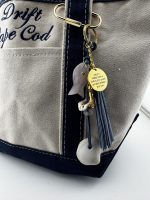 The Charm With Tassel - Image 13